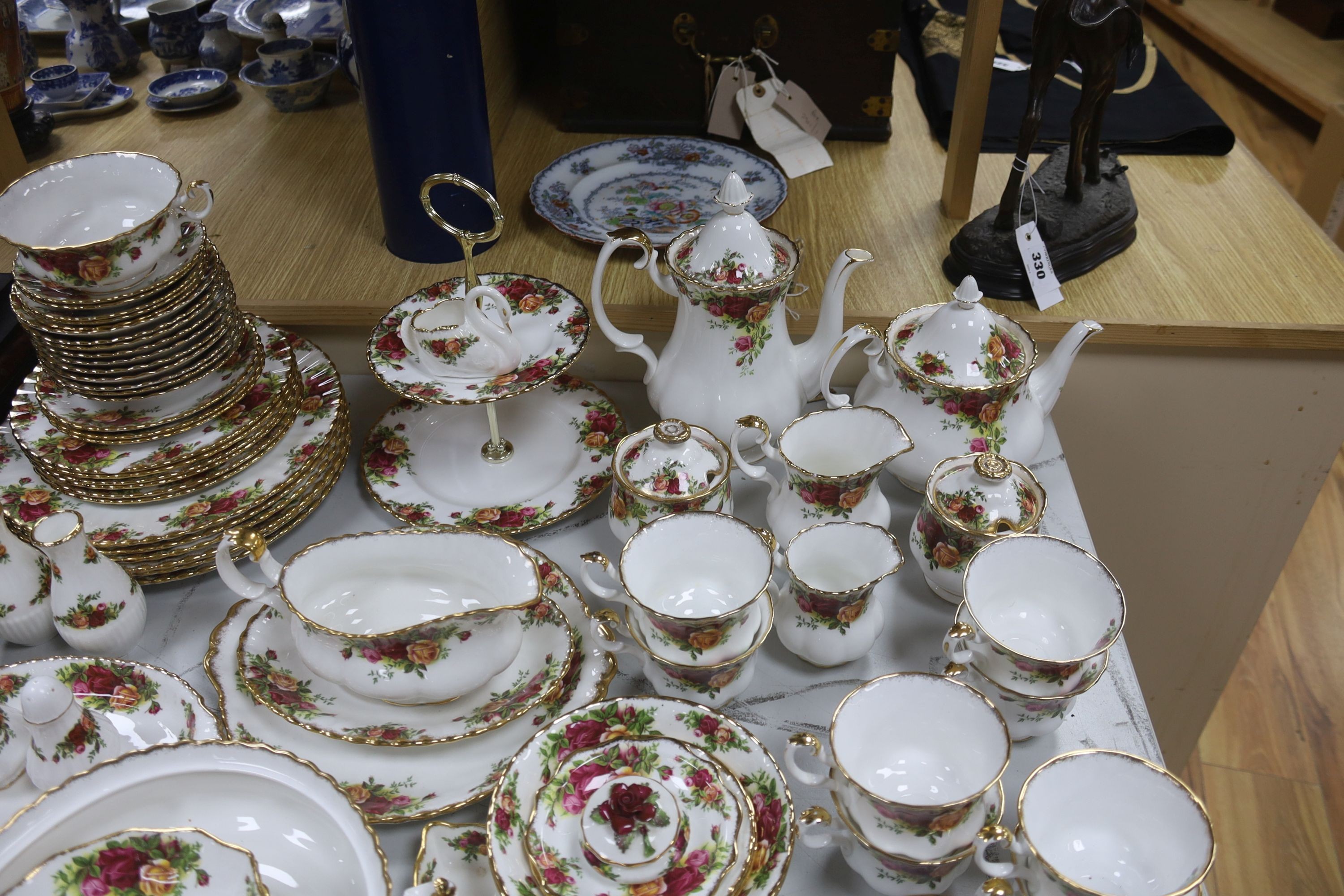 A Royal Albert Old Country Rose tea service, part coffee service and part dinner service